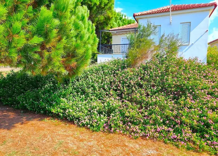 Romanos Beach Villas Aparthotel 4*