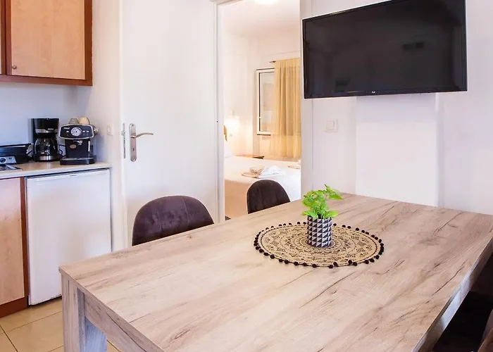 Romanos Beach Villas Aparthotel 4*