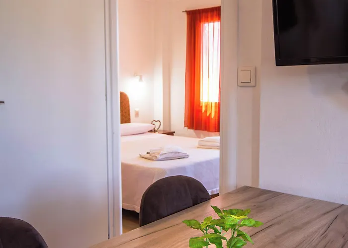 아파트호텔 Romanos Beach Villas 4*