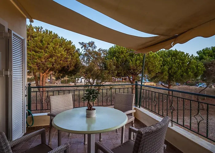 Romanos Beach Villas 4*