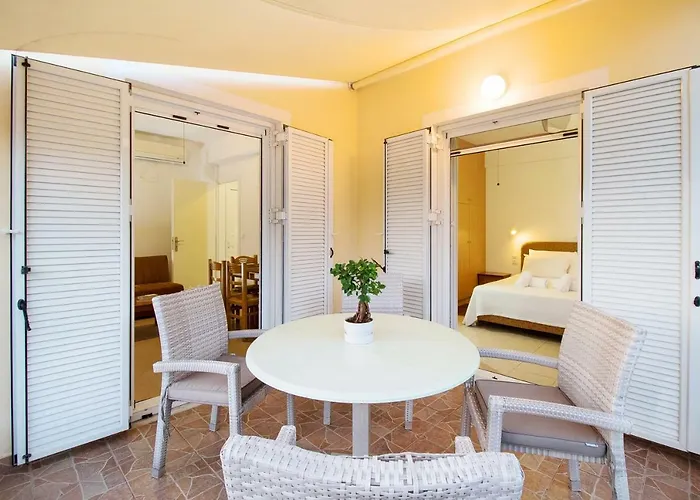 Romanos Beach Villas 4*